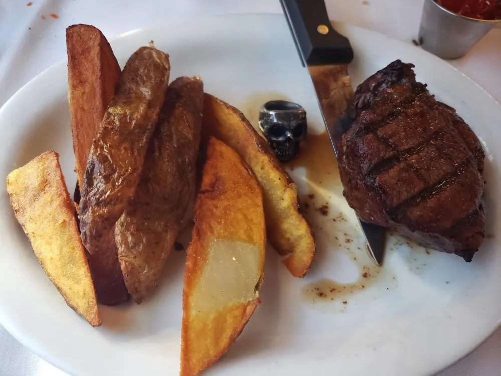 Filet with Potato Wedges and My Shannon Larrot Skull Ring